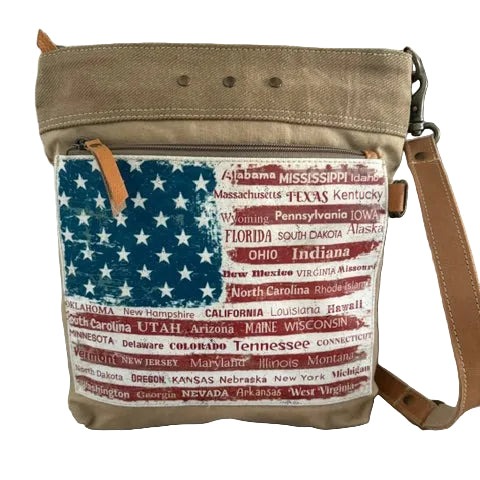 American Flag Crossbody Patriotic Bag with an American flag design on the front zip pocket with all the state names included. Crafted from Recycled Military Canvas and handsewn. Tan bag with adjustable crossbody strap.