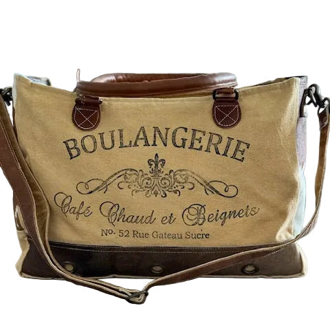 Recycled Military Canvas bag with 'Boulangerie' text on front with a detachable crossbody strap, leather handles and cowhide on the front of the bag