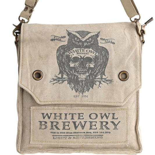 Canvas bag with White Owl Brewery branding and owl design on a white background