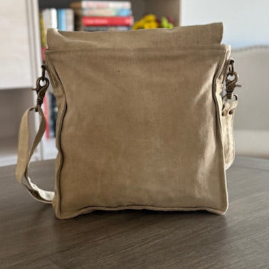 white owl brewery messenger bag with skull back view