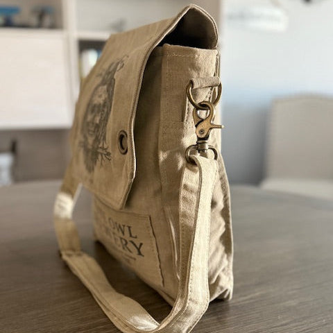 white owl brewery messenger bag with skull side view