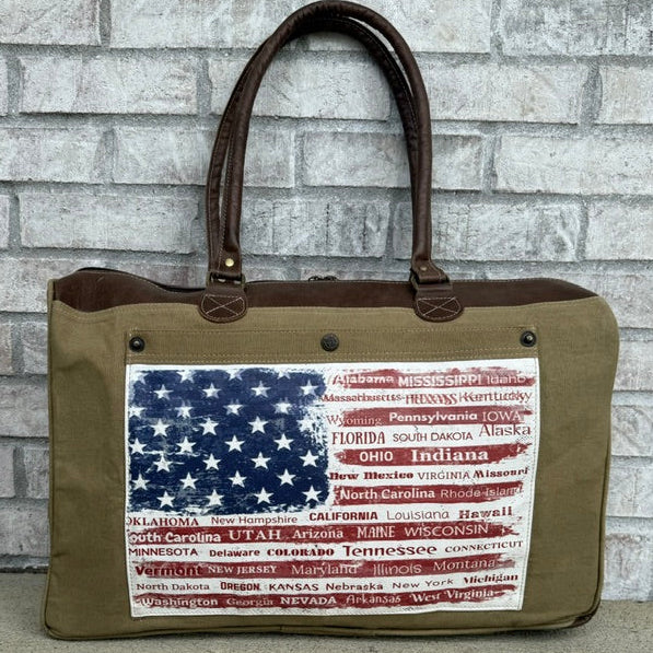 Recycled Military Canvas Flag Weekender with American Flag Front Pocket. Make of repurposed military canvas.