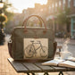 Recycled Military Canvas Green bag with brown leather straps and bicycle design on a large front pocket. Leather handle and accents