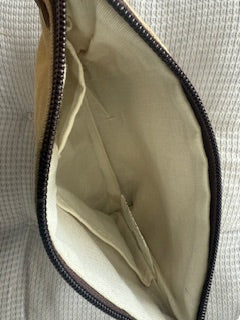 Inside view of the Queen Bee canvas wristlet, pouch or carry all constructed or repurposed military canvas with a queen bee print on the front