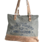 This UpCycled Oriver Winery Bag is constructed of repurposed military tent and tarp canvas. Bag Says : Oriver Winery, established 1972, Vineyards (in black distressed print). Durable enough to make every day an adventure yet still looks classy. Use as a small travel bag, everyday purse, or tote.