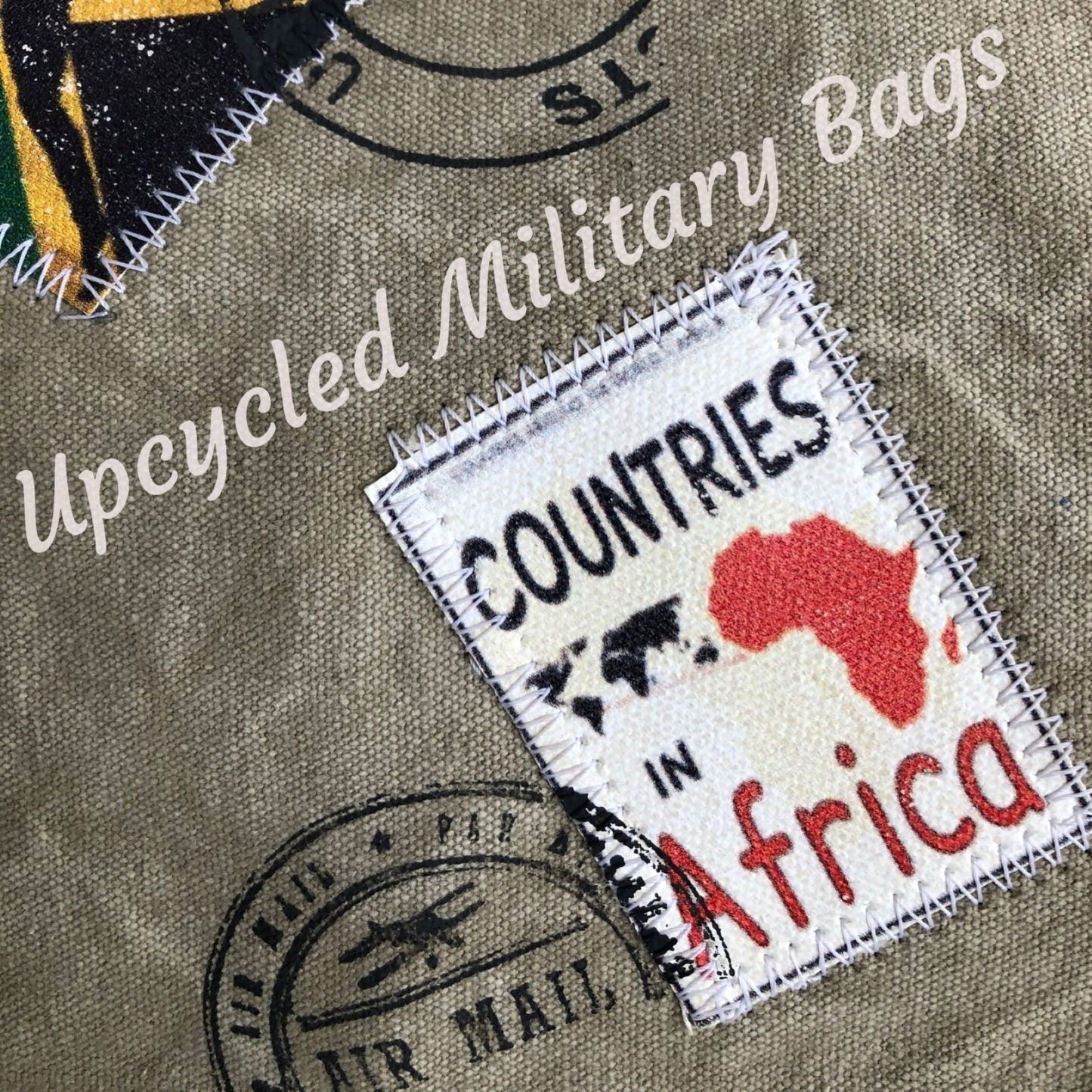 The UpCycled Travel Stamp Backpack is upcycled, crafted from re-purposed military tents, tarps and canvas. Vintage inspired with patches of travel stamps: USA, Africa, Denmark and more. Sturdy heavy canvas on this medium sized backpack. Tan with brown accents. Features include: FRONT MAGNETIC CLOSURE, ZIP TOP CLOSURE, Dimensions are 13" x 13.5" X 4", FRONT POCKET, BACK ZIPPED POCKET FULLY LINED, 1 ZIPPED INSIDE POCKET, ADJUSTABLE STRAP.